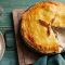 Freshly baked chicken pie with a flaky crust at Local Takeaway in Sydney